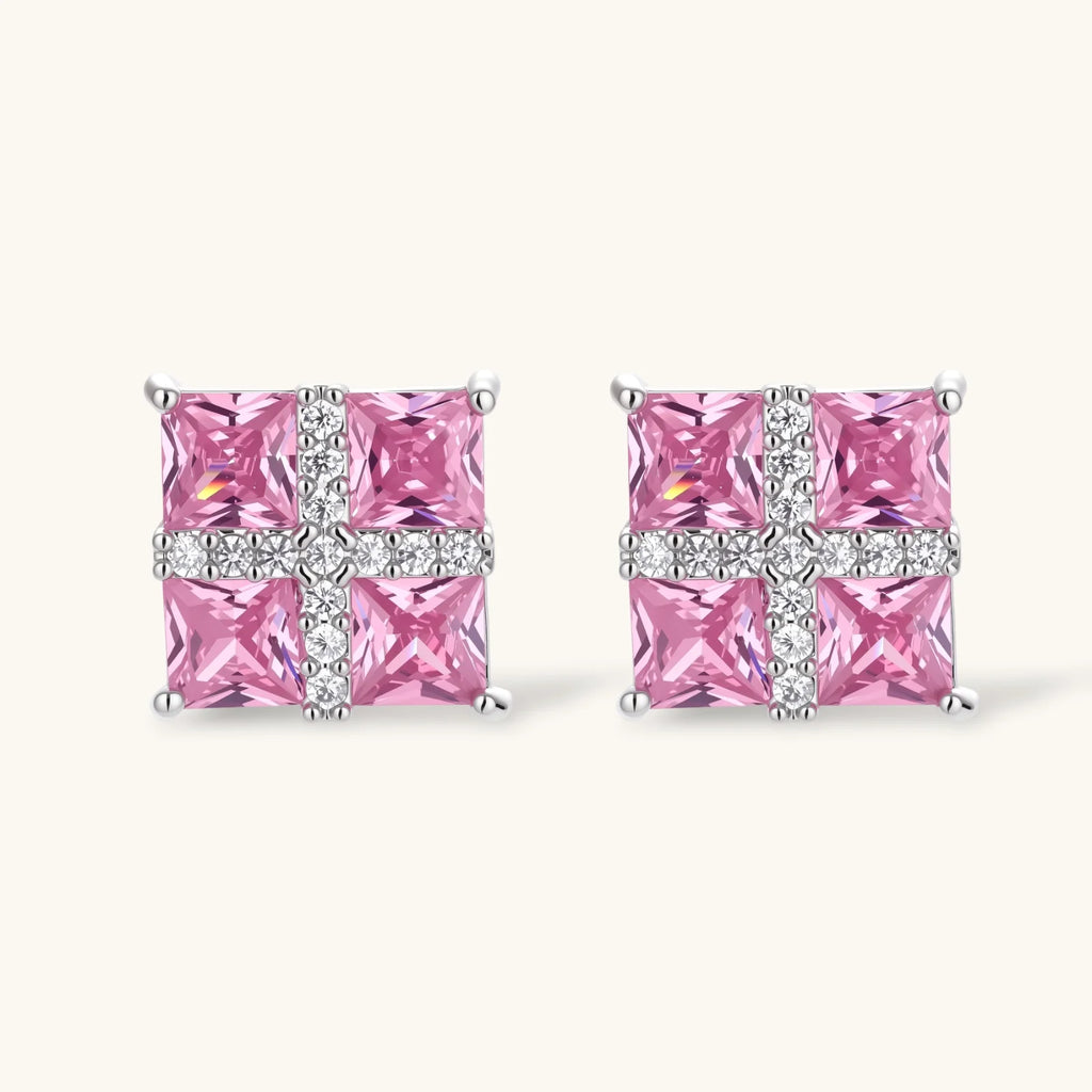 White gold plated jewelry set with pink cubic zirconia stones in geometric cross design, featuring Y-necklace and square stud earrings